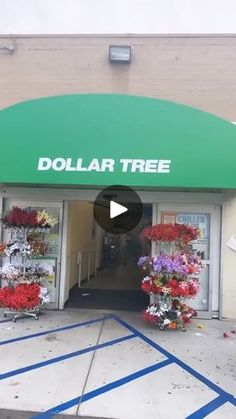 a dollar tree store front with flowers on display