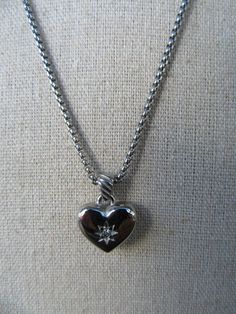 90s silver tone bejeweled heart pendant necklace. Lobster claw closure. Clear rhinestone details. So pretty Total 18" long with a couple inches of jump chain so fastens anywhere from 16 to 18" mark Heart is 1/2" x 5/8" Nice and bright with no noted flaws. So pretty! 90s Jewelry, Cool Necklaces, Jewelry Inspo, Minimalist Necklace, Heart Pendant Necklace, Clear Rhinestones, Minimalist Jewelry, Cute Jewelry, Earings Piercings