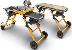 two work tables with wheels on each side, one being powered by an electric sawing machine