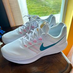 Size 11 White Nike Shoes With Pink And Teal. Never Worn. Nike Shoes White, Nike Athletic Shoes, Teal Nikes, White Nike Shoes, Brown Blonde Hair, Cute Nikes, Brown Blonde, White Nike