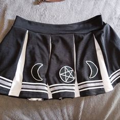 Selling A Brand New Witchy Cheerleader Mini Skirt. Is Brand New But Without Tags. Perfect To Gift Or For Yourself And Perfect For Fall/Halloween Vibes Fitted Grunge Mini Skirt For Cosplay, Black Punk Skirt For School, Black Punk Mini Skirt For School, White Cotton Harajuku Style Skirt, Black Grunge Pleated Mini Skirt, Black Harajuku Skort For Summer, White Harajuku School Bottoms, White Harajuku Style School Bottoms, Harajuku Cotton Skort