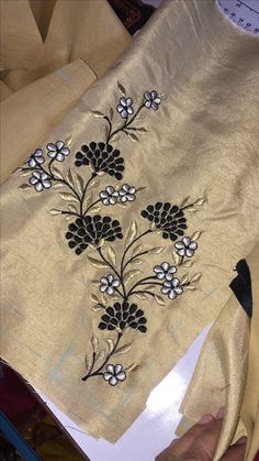 the fabric is being sewn together to make it look like they have flowers on them