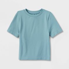 This Seamless Jersey Crop Top from A New Day™ in a solid colors offers easy pairing with a range of looks. Fashioned in a cropped length, it features a classic crewneck and a slim silhouette to give you a fitted look. The lightweight fabric with added stretch and a seamless design offers a more comfortable fit, and you can wear it with your choice of bottoms to create a range of versatile styles. . A New Day™: Style that goes wherever you do. Jersey Crop Top, Fall Runway, Crop Blazer, Baby T Shirt, Slim Fit Shorts, Baby Tshirts, A New Day, Teal Blue, New York Fashion Week