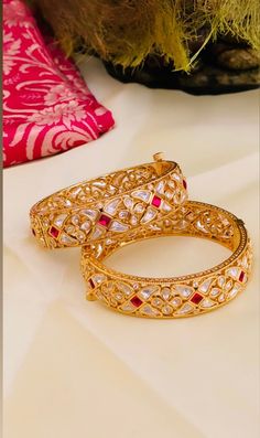 High End Premium Quality Wedding Bangles/ Indian Bridal Wedding Bangles/Kundan Kada/Gold Bangles/Bracelet/Indian Jewelry/Punjabi Kada/Elegant Indian bangles set with Kundan work kada, Gold Bangles, Wedding Bangles, Indian Pakistani Wedding Jewelry, Bridesmaids bangles Details :- Stone - Kundan Metal - Brass Quality - Fine Brass Metal  Closure:- Screw Type Plating:- Gold Plated Openable bangle in 22 k gold plating Beautiful Looks at One Glance - with Intricate gold plated creates Glamorous Reflections and adds Luxurious Looks. Ready to ship from Indian To measure the size of the bangle: Please refer to the size guide in the picture above.. Such intricate detailing in this Inspired Royal Bangles with Flawless Polki and Diamond work. Finest Kundan work . Highest quality and best craftsmanship Wedding Bangles Indian, Punjabi Kada, Pakistani Wedding Jewelry, Kundan Kada, Bangles Bridal, Wedding Bangles, Ruby Bangles, Brass Jewellery, Kundan Work