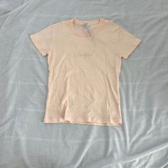 Brandy Melville Embroidered ‘New York’ Tee One Size Condition: Nwt Color: Pink Brand: Brandy Melville Details : - Short Sleeve Tee - Stretchy Extras: - I Ship Between 1-2 Days Casual Embroidered T-shirt For Loungewear, Casual Embroidered Loungewear T-shirt, Trendy Embroidered Logo Tops For Loungewear, Embroidered Logo Tops For Summer, Cotton Tops With Embroidered Logo For Loungewear, Tops Brandy Melville, Pink Brand, Brandy Melville Tops, Brandy Melville