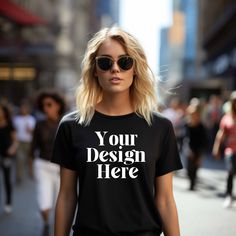 https://www.etsy.com/listing/1602051338/gildan-64000-mockup-bundle-tshirt-men Discover the ultimate Gildan 64000 mockup black by Orispot Mockups! Elevate your designs with our unparalleled selection of modern and captivating digital mockups, offered at an affordable price. Immerse yourself in this Gildan 64000 mockup black, featuring the iconic Gildan T-shirt in a pristine black color. Having a spotless, wrinkle-free, and color-accurate mockup is essential for any Print on Demand business! Mockup Details: Mockup type: T-shirt Model type: Female Model Resolution: 10,000 x 10,000 Pixels Mockup Color: Black Please keep in mind that this is a digital product offering swift delivery and instant access. Once your payment is cleared, you'll receive a download link via email or can access your pur Black T-shirt With Custom Print For Fans, Black Custom Print T-shirt, Fan Apparel, Black Custom Print Fan Apparel T-shirt, Black Custom Print Fan T-shirt, Fan Apparel T-shirt With Custom Print And Short Sleeves, Band Merch T-shirt With Custom Print, Band Merch T-shirt With Custom Print And Short Sleeves, Custom Print Short Sleeve T-shirt For Fans, Black Branded T-shirt For Fan Merchandise