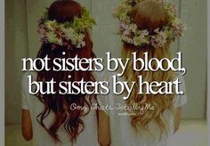 two girls with flowers in their hair and the words not sisters by blood, but sisters by heart