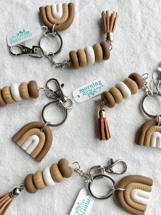 several key chains with different shapes and colors