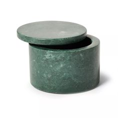 two green marble boxes sitting on top of each other