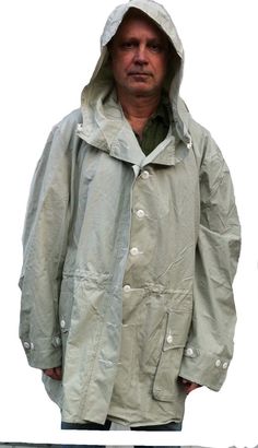 Original Swedish army snow camo jacket smock made of cotton and never used. NOS. Intended for use over the winter uniform so it is large in size. Hood with drawstring . Drawstring at waist. Buttons at the cuff. Two large pockets. Closure with hidden/protected buttons. The jacket was designed in the 1960s and the jackets offered were made 1969 and 1976 so they have been stored for many years. The size is Swedish size C50 which is the medium size of the three sizes that was manufactured Approximat Hooded Cotton Hunting Outerwear, White Winter Raincoat With Pockets, White Raincoat With Pockets For Winter, Combat Style Cotton Hunting Outerwear, Combat Style Hooded Cotton Parka, Combat Cotton Outerwear For Hunting, Combat Style Cotton Outerwear For Hunting, Combat Cotton Hooded Utility Jacket, Winter Uniform