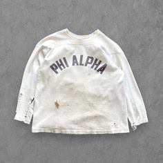 "Vintage Champion Running Man Phi Alpha Sweatshirt, 1950's Size Large // Soft cotton construction, double layer shoulders and elbow pads, single stitch hem and sleeves, printed at front, original tag intact near lower left hem, excellently thrashed condition with holes and marks throughout. Measurements: Chest 23\", Length 26\", Sleeve Length 24\"" Vintage Sweatshirt Lightinthebox, Vintage Champion Sweatshirt, Vintage Tshirt Design, Minimal Shirt Design, Vintage Running, Black Men Fashion Urban, Vintage Sportswear, Shirt Design Inspiration, Street Fashion Men Streetwear