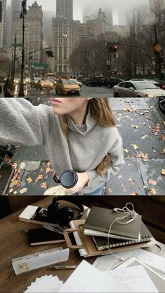 a woman taking a selfie with her cell phone in front of the city skyline