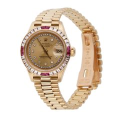 This is an authentic Rolex Presidential watch with a Rolex dial with added aftermarket diamond markers, a custom 18k yellow gold diamond and ruby bezel, a Rolex 18K yellow gold president band. The case diameter is 26mm. Victoria Adams, Rolex Watch Price, Rolex Presidential, Rolex Watches For Sale, Used Rolex, Gold Diamond Watches, Rolex Watches Women, Gold Rolex, Rolex Watches For Men