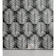 an abstract black and white wallpaper design with leaves on the side, in front of a