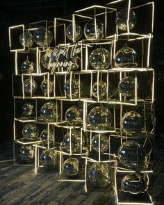 a bunch of glass balls that are on display