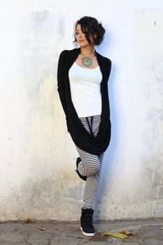 This long sleeves is made of light weight GOTS certified organic cotton.  From classic elegant to cozy lounge wear layer or after yoga layer this piece is ultra versatile.  Wear 3 different ways.>>>>> details <<<<<• Strippy textured light weight organic cotton• Extra long sleeves • Mini button in the back to play with different adjustment See more beautiful long sleeves here : https://www.etsy.com/shop/SATICREATION?section_id=11291025&ref=shopsection_leftnav_8Ho Casual Fall Outerwear For Yoga, Vest Hoodie, Long Sleeve Layer, Eco Clothing, Shrugs And Boleros, Hoodie Vest, Bamboo Clothing, Cozy Lounge, Wear Crop Top