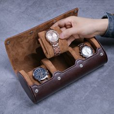 ❖Premium material: All watch cases are handmade from high quality PU leather. ❖Press button opening: It is designed with snap buttons for easy opening and closing. ❖Unique design: The watch compartment has sliding pads and three soft pillows that slide in and out for easy access. It protects the watches inside 100% from damage, and keeps watches safe from bumps. ❖Great gift: Suitable for Valentine's Day, Anniversary, Wedding gift, Groomsmen Gift, Birthday, Halloween, Thanksgiving day, Graduation Brown Business Watch With Round Case, Brown Business Watch, Brown Watch Accessories Box As Gift, Brown Watch Accessories With Subdials As Gift, Business Brown Watch Accessories Box, Business Brown Box Watch Accessories, Leather Watch Accessories With Box For Gift, Leather Watch Case, Watch Safes