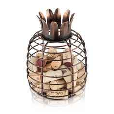 a metal container filled with lots of wine corks