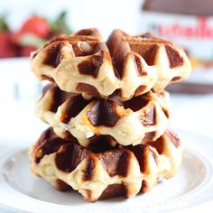 chocolate covered waffles stacked on top of each other