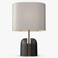 a table lamp with a white shade on it's base and a wooden base