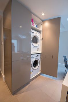 a washer and dryer in a very small room