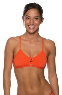 The Tomcat is a supportive athletic bikini top with a scooped neckline and tie straps for an adjustable fit. Shop the Tomcat in bolds and fun prints today. Sporty Beach Tankini With Built-in Bra, Strappy Tankini With Built-in Bra, T-back Sports Bra For Swimming, Summer Sports Bra With Strappy Back, Adjustable Straps Sports Bra For Swimming, Bra Friendly Strappy Tankini, Summer Sports Swimwear With Tie Back, Sports Tankini With Removable Bra Pads, Casual Strappy Swimwear Bra Friendly