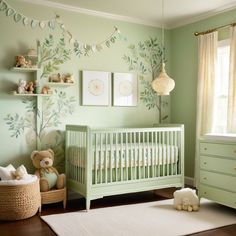 a baby's room decorated in green and white