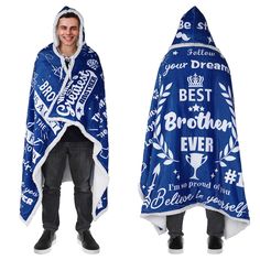 a man wearing a blue and white hooded ponchy with the words best brother on it