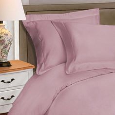 Settle down for the night in the cozy comfort of the Edmont Egyptian quality cotton 530 Thread Count Duvet Cover Set with Pillow Shams. This duvet cover set is crafted from luxuriously soft Egyptian quality cotton fibers, which are strong, lightweight, and breathable. This duvet cover fastens with clear, hidden buttons and four corner ties to make sure your duvet insert doesn't shift or come undone. For a coordinated look, the included pillow shams feature a 2-inch flange for subtle elegance. Bi Purple Satin Bedding, Muave Duvet Cover, Lavender Silk Pillowcase, Purple Satin Pillowcase, 100% Mulberry Silk Sheets, Sham Bedding, Come Undone, Yellow Home Decor, Subtle Elegance