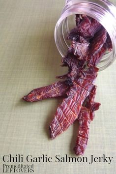 dried gourmet beef strips in a jar on a table with the lid open