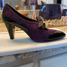 Nwt Liz Claiborne Purple Suede W/ Black Patent Tie Closed Toe Heels 8 3” Heels Brand New Never Worn Pet And Smoke Free Home Purple Pointed Toe Heels For Formal Occasions, Purple Heels With 4-inch Almond Toe, Purple Almond Toe Heels With 4-inch Heel, Fitted Purple Heels For Formal Occasions, Purple Leather Pointed Toe Heels, Purple Leather Heels With Pointed Toe, Purple Round Toe Heels For Office, Purple High Heels Medium Width, Chic Purple Heels For Formal Occasions