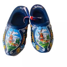 children's slippers with windmills painted on them