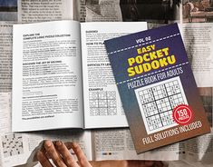 an open book with sudoku puzzles on it