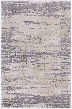 an area rug with grey and white colors