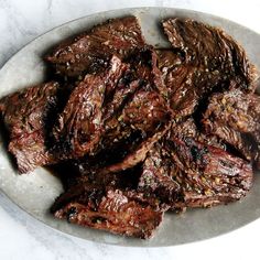 the steak is cooked and ready to be eaten on the plate for dinner or as an appetizer