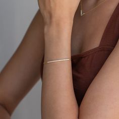 S E L E N A ∙ D I A M O N D ∙ B R A C E L E T Diamonds are a girl's best friend! Our Selena Diamond Bar Bracelet features a delicate bar glistening with diamonds on a simple chain. The perfect blend of minimalistic opulence to add to your ensemble. * Material: High Quality Solid 925 Sterling Silver * Finish: Sterling Silver ∙ 18K Gold * Featuring ~38mm x 2mm Pave Bar with CZ Diamond stones and adjustable chain 6 to 8 inches. H O W ∙ T O ∙ O R D E R * Select your finish in the drop down menu. Des Bracelet For Wedding, Diamond Bar Bracelet, Gold Bar Bracelet, Anniversary Gift For Wife, Bar Bracelet, Diamond Bar, D B, Anniversary Gifts For Wife, Bar Bracelets