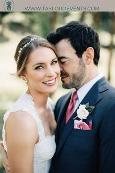 a bride and groom posing for a photo