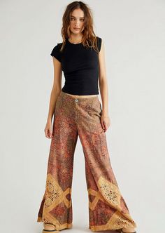 *********Free People These stunning pants are featured in a mid-rise, exaggerated wide-leg silhouette with vintage-inspired floral print and crochet lace piecing throughout. Zip fly and button closure Side pockets Relaxed, billowy, wide-leg fit Size 0 New with tags Hundreds of new Free People clothes, shoes and BAGS just listed. Lots of fabulous stuff! Modesty Journey, Sweet Surrender, People Clothes, Boho Pants, Fashion Wishlist, Boho Summer, Free People Pants, Printed Pants, Pants Outfit