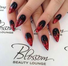 Nail designs for Halloween need careful consideration.  An outdated or ill-suited design can detract from your overall look. 
#HalloweenNails #SpookyNails #NailArt #HalloweenManicure #TrickOrTreatNails Ongles Goth, Red Black Nails, Fun Halloween Nails, Nails With Glitter, Halloween Nails Easy, Nails Ombre, Gothic Nails, Goth Nails, Red Nail Designs