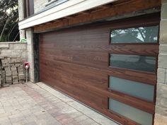 a wooden garage door is shown in this image