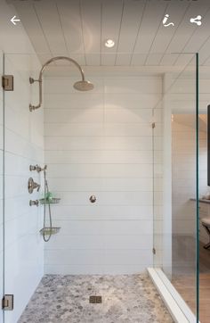 a bathroom with a walk in shower next to a bathtub and sink under the faucet