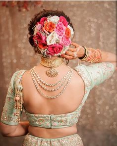 a woman with flowers in her hair