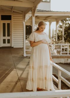 "Maternity Photoshoot Dress for Pregnancy, Dress for Photography Maternity 🌸 Introducing our versatile cotton maxi tiered dress, perfect for spring and summer, designed for both style and comfort. 📏 Sizing: Fits S to XL (US sizes 4/6/8/10/12/14) 👗 Description: - Available in white or cream, made with lightweight 100% cotton for breathability. - Sweet and feminine design with lovely lace trim on each tier, adding charm and elegance. - - Lined up to the knees for coverage and comfort. - Elastic Fitted White Maternity Dress For Baptism, Flowy Maternity Dress With Lace Trim, Maternity Wear Dresses With Lace Trim, Fitted Cream Maxi Maternity Dress, Bohemian Maternity Dress With Short Sleeves, White Flowy Maxi Dress For Maternity, Bohemian White Maternity Wear Dresses, Bohemian White Maternity Dresses, Baby Shower Maternity Dress