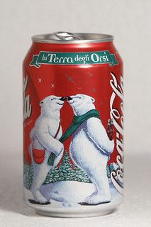 a can of coca - cola with two polar bears on it