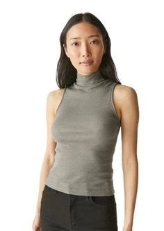 Elevate your style with our Lino Mock Neck Tank in Granite! Featuring a mock neck design and a body-skimming fit, this sleeveless top is perfect for any occasion. Wear it alone for a fun party look or layer it under a blazer for a touch of sparkle. Feel confident and chic in this must-have addition to your wardrobe. One Size-runs like a small/medium Versatile High Neck Tank Top For Spring, Spring High Neck Fitted Tank Top, Fitted High Neck Tank Top For Spring, Trendy Turtleneck Tank Top For Spring, Casual Sleeveless Mock Neck Top, Trendy Turtleneck Tank Top For Summer, Trendy High Neck High Stretch Tank Top, High Stretch Turtleneck Tank Top For Spring, Trendy Turtleneck Tank Top For Fall