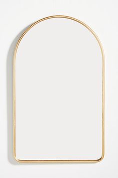 With a thin metal frame that epitomizes midcentury charm, this tasteful mirror is at home in any room. Powder Room Mirror, Oval Mirror Bathroom, Mirror Decor Ideas, Mood Board Interior, Logo Minimalista, Interior Design Mood Board, Gold Border, Oval Mirror, Bathroom Wallpaper