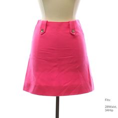 Late 60s or Early 70s "Home Sewn" Womens hot pink wool acrylic blend lowered waist hip-hugger style skirt having a center back zipper closing. Dual tabs on the front and back are held in place by a single silver metal button. Inside is lined by white silky acetate fabric. This mini-length garment measures 17inches from waist to hem. Fits: 28Waist, 34Hip Our item # 389004-A26607 Pink Short Length Skort For Work, Pink Mini Length Skort For Workwear, Pink Skort For Spring Workwear, Pink Skort For Workwear, Pink Workwear Skirt, Pink Mini Length Bottoms For Work, Retro Fitted Pink Skort, Fitted Pink Mini Skirt For Workwear, Pink A-line Skirt For Workwear