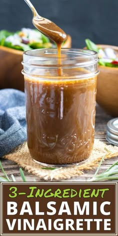 balsamic vinaigrette sauce in a jar with a spoon