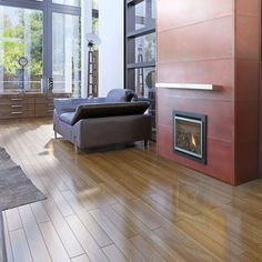 a living room with wood flooring and a fire place in the middle of it