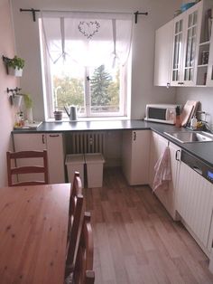 the kitchen is clean and ready to be used for cooking or baking, with no one in it